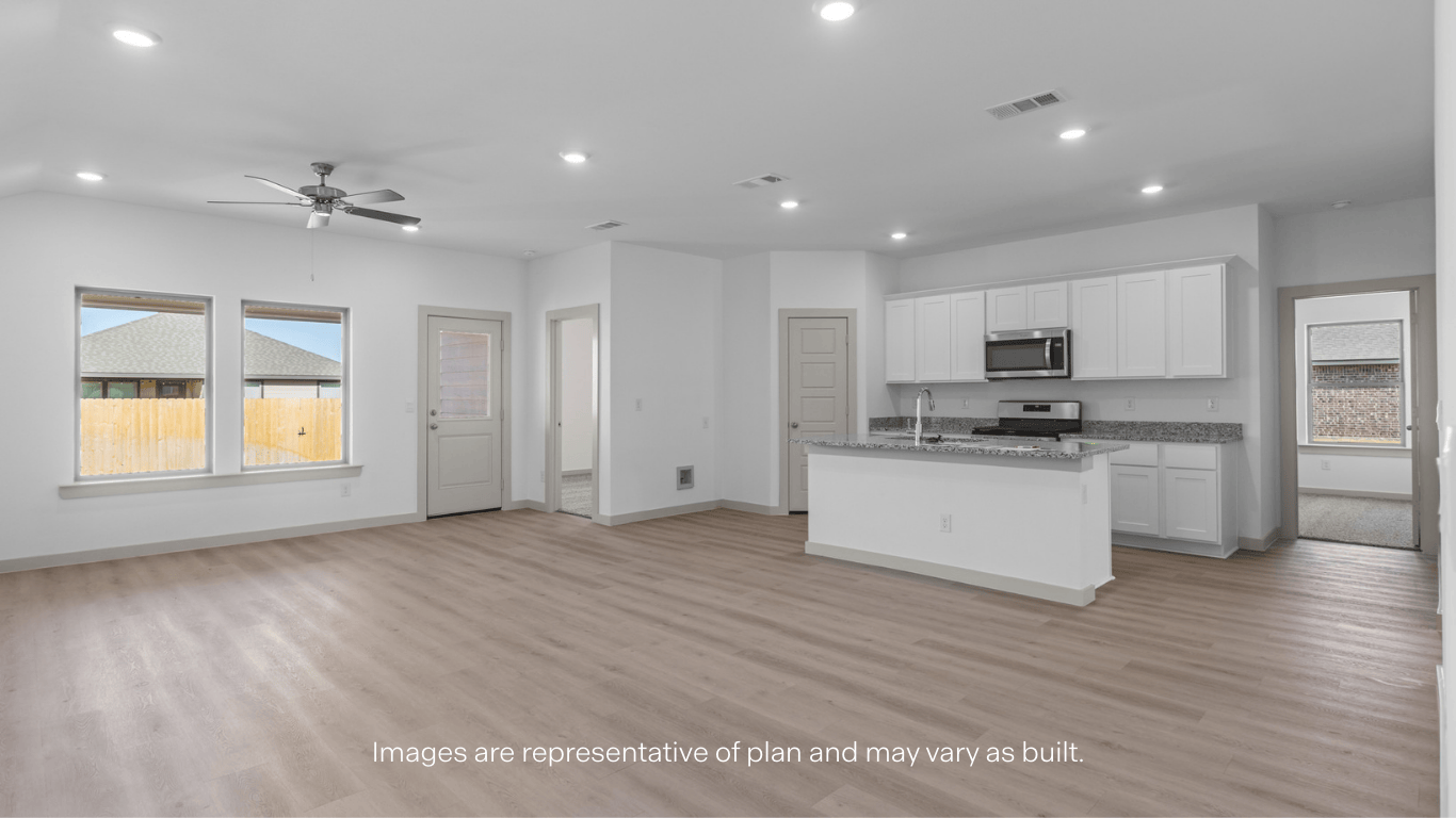 Open concept kitchen, living, family, and dining room space