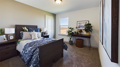 secondary bedroom with plush carpet