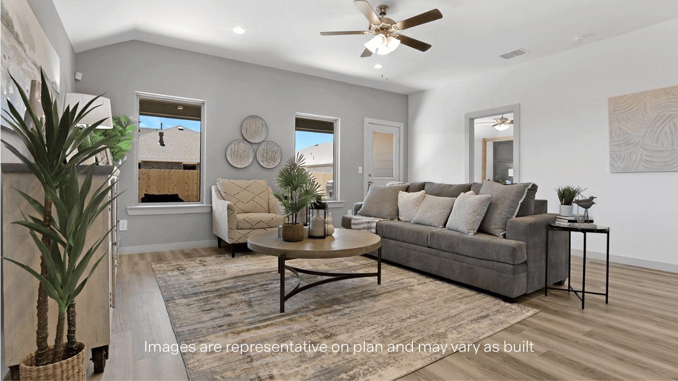 Open living and family room area with ample natural light