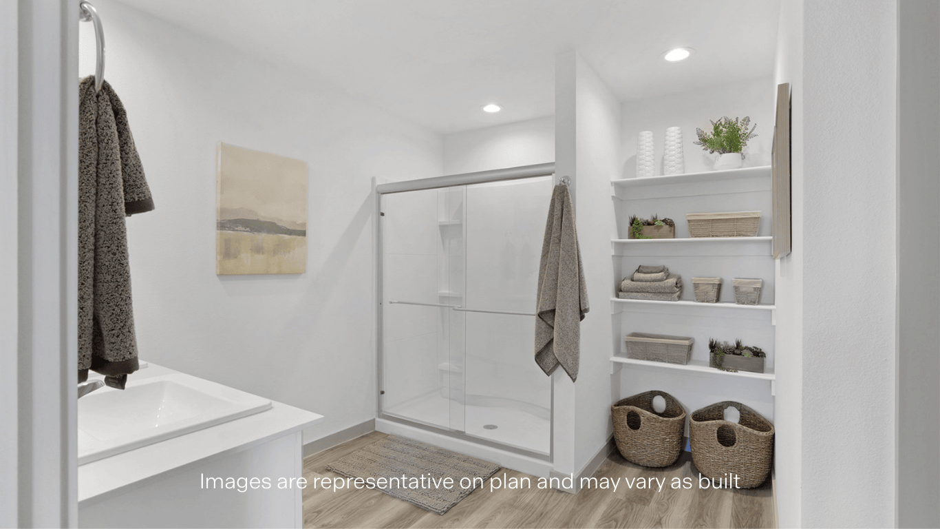 Primary bathroom with luxurious shower and built in storage