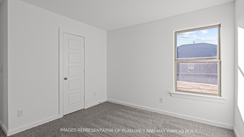 Interior bedroom with large window and closet