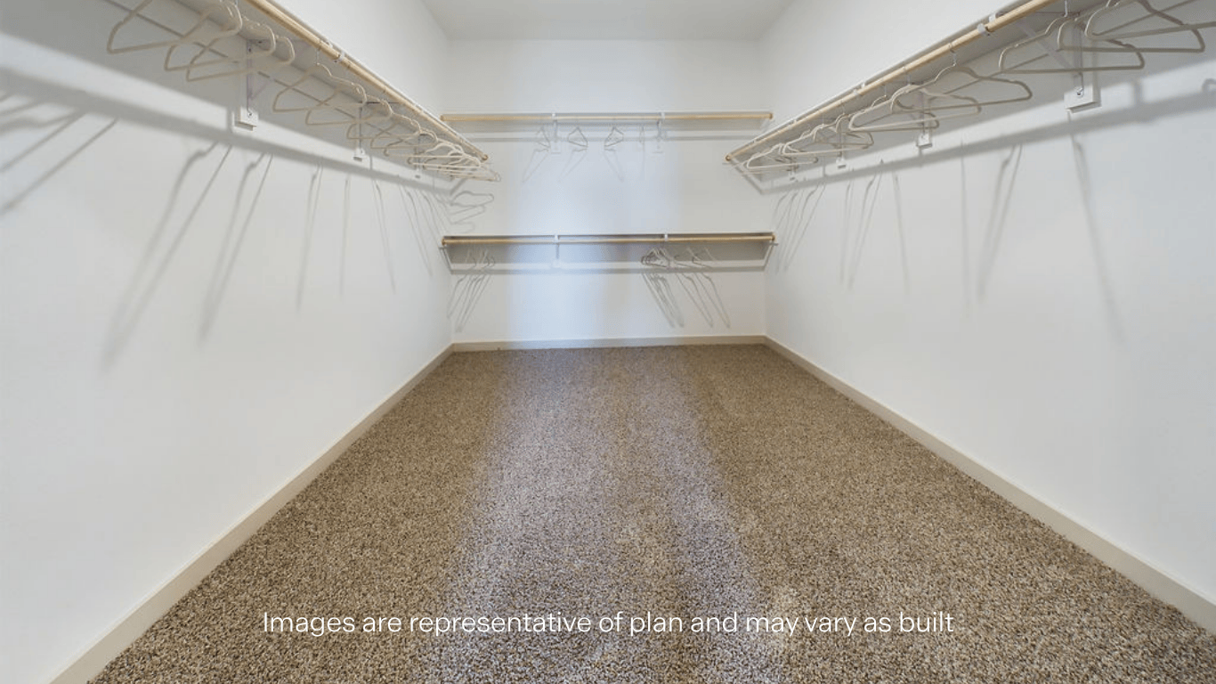 Primary walk-in closet with extra storage space