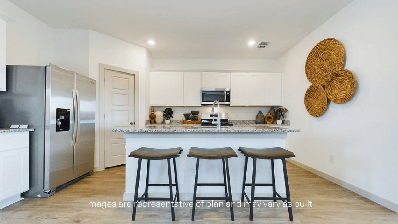 Open concept kitchen with stainless steel appliances, shaker style cabinets, and elevated finishes