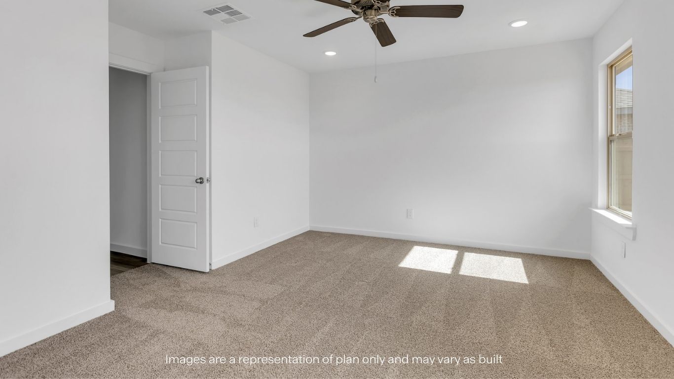 Primary bedroom with private attached bathroom and walk-in closet