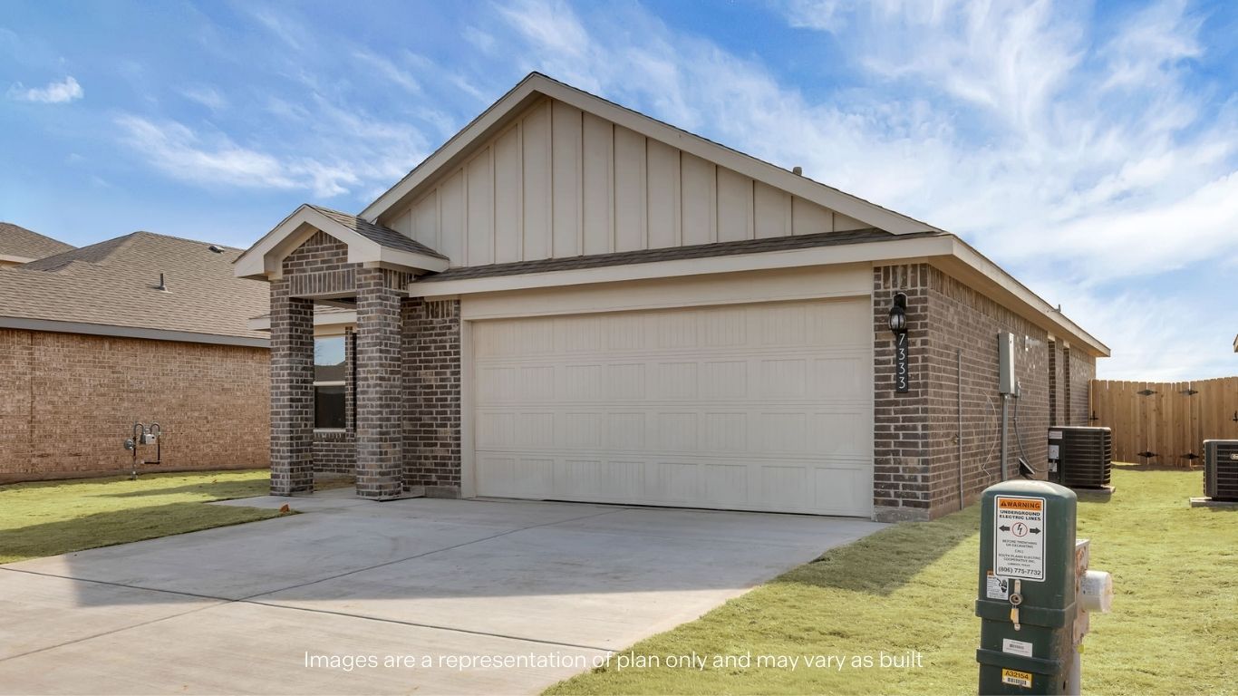 Side view of single story timeless brick home