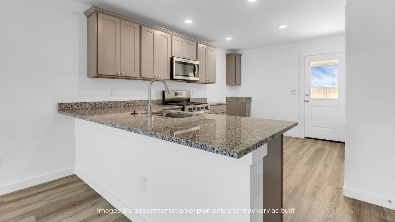 Spacious open concept kitchen with island and counter prep space