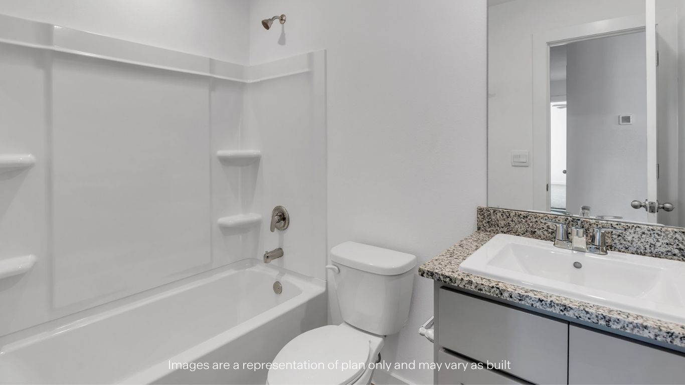 Guest bathroom with built in vanity and combination bathtub shower