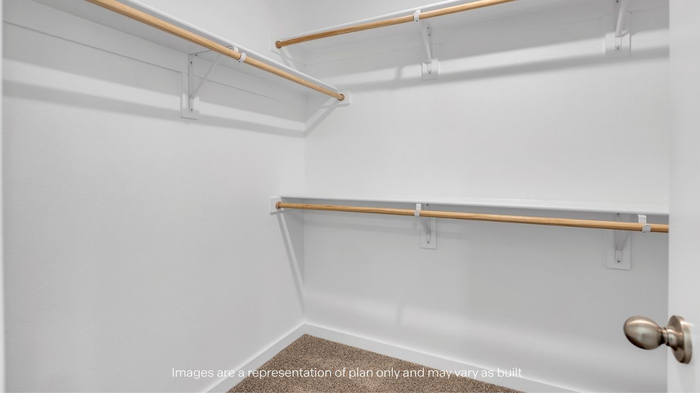 Primary walk-in closet with extra storage space