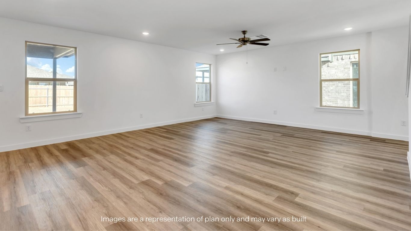 Open living and family room area with ample natural light