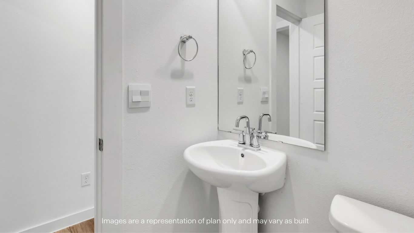 Half bathroom between common spaces