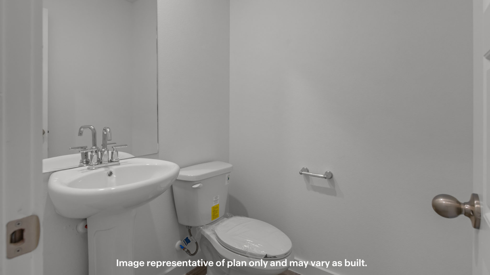 Half bathroom between common spaces