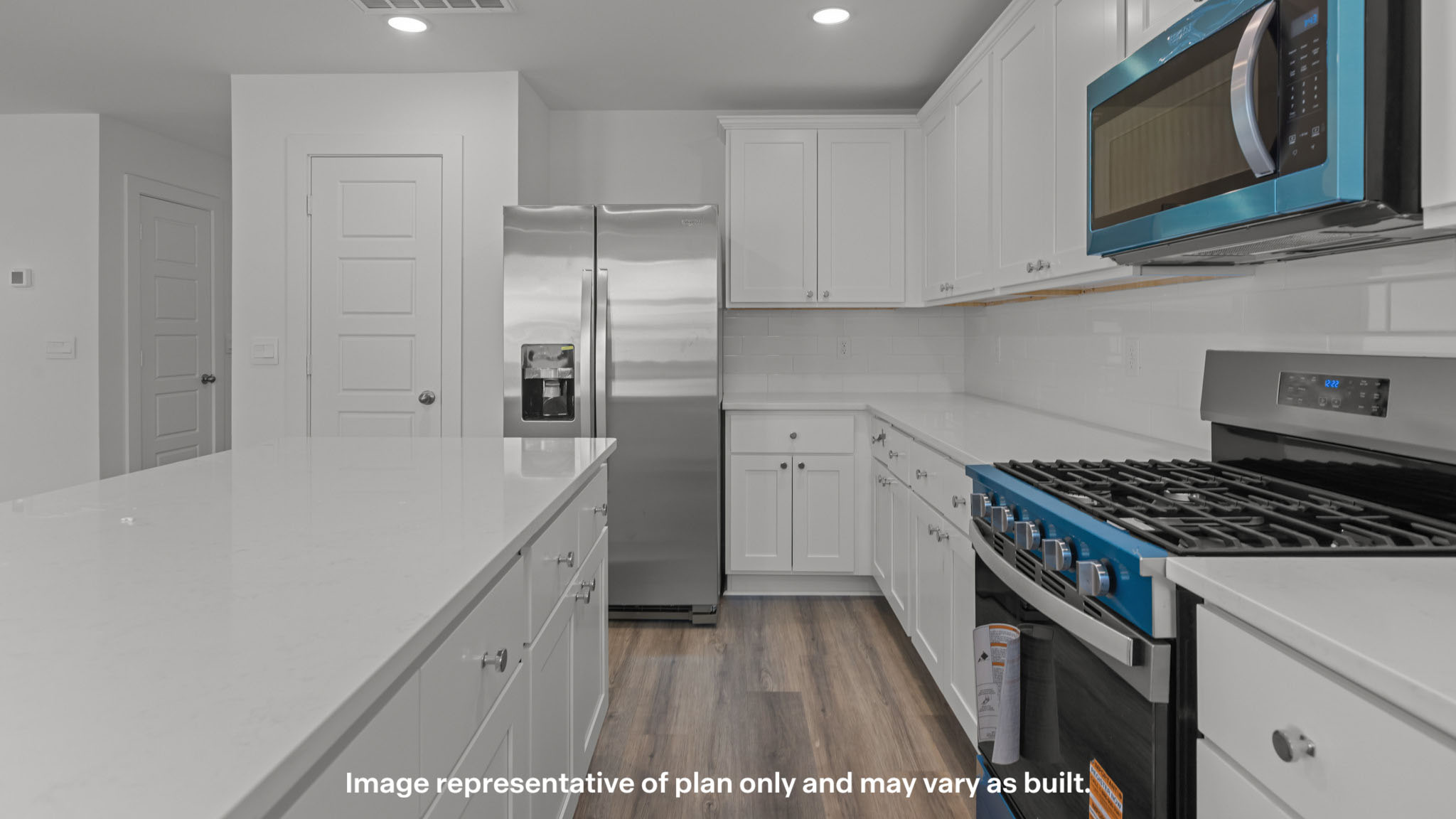 Spacious open kitchen overlooking family and living space