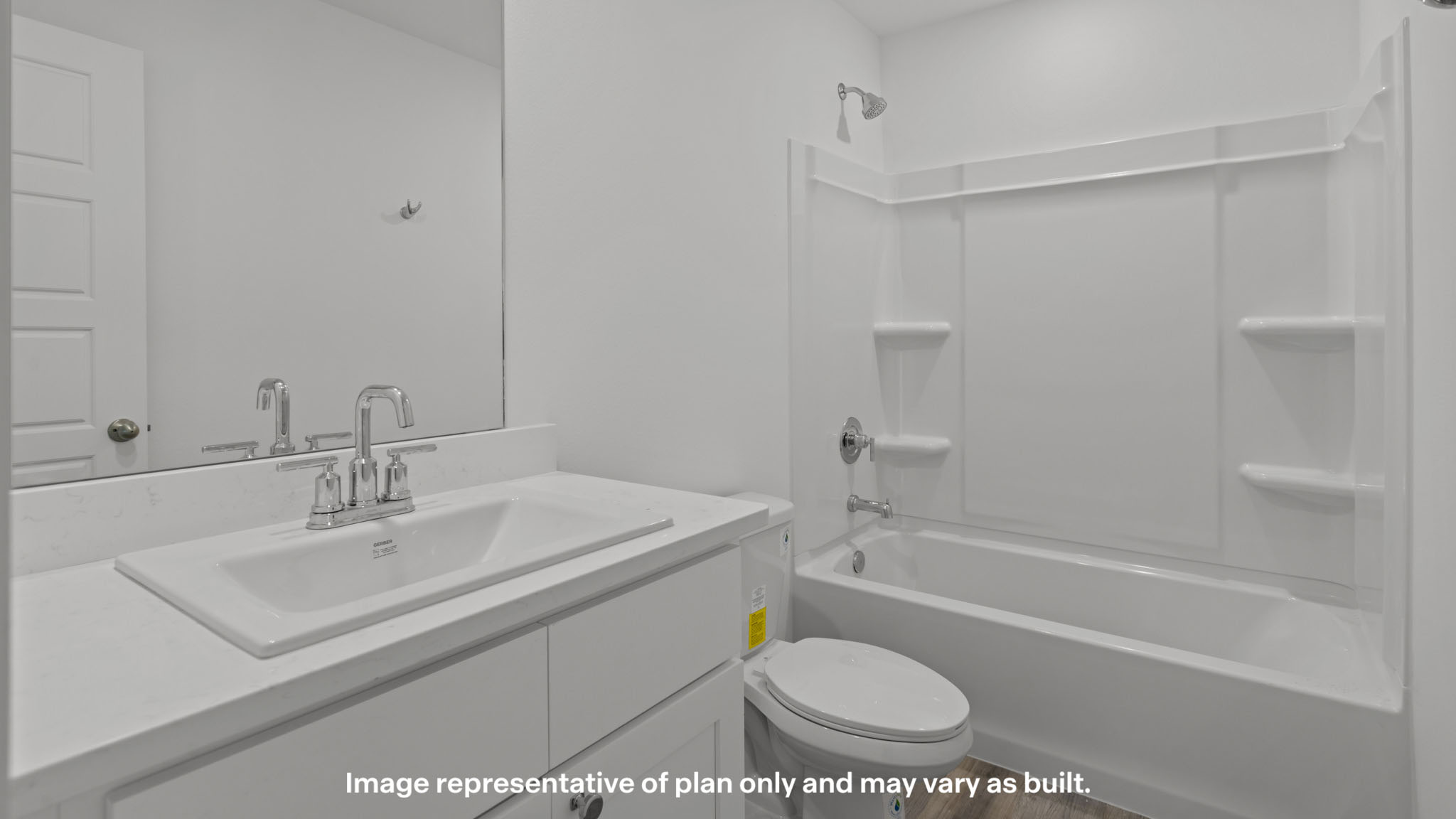 Upstairs guest bathroom with combination shower and bathtub