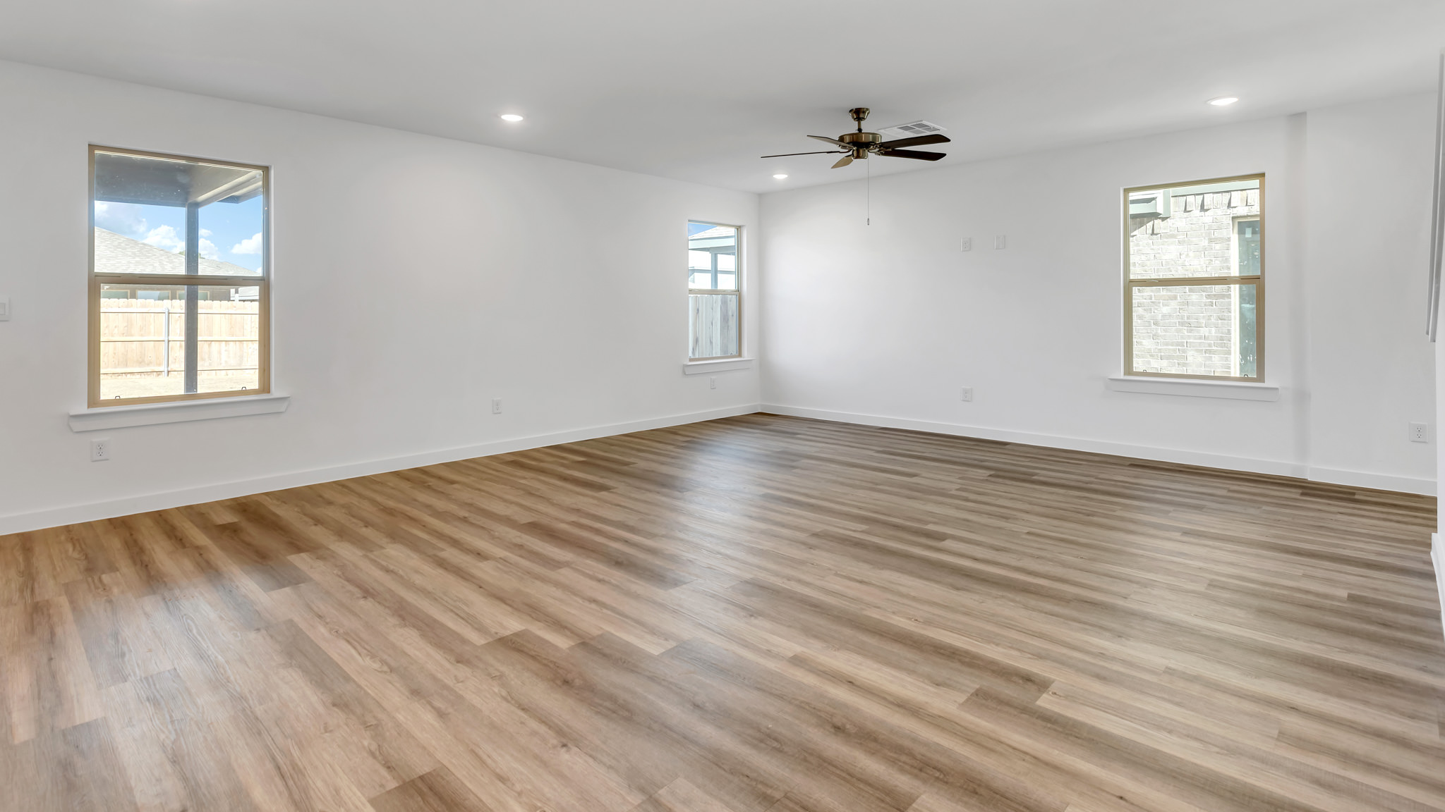 Spacious living and family room with ample lighting