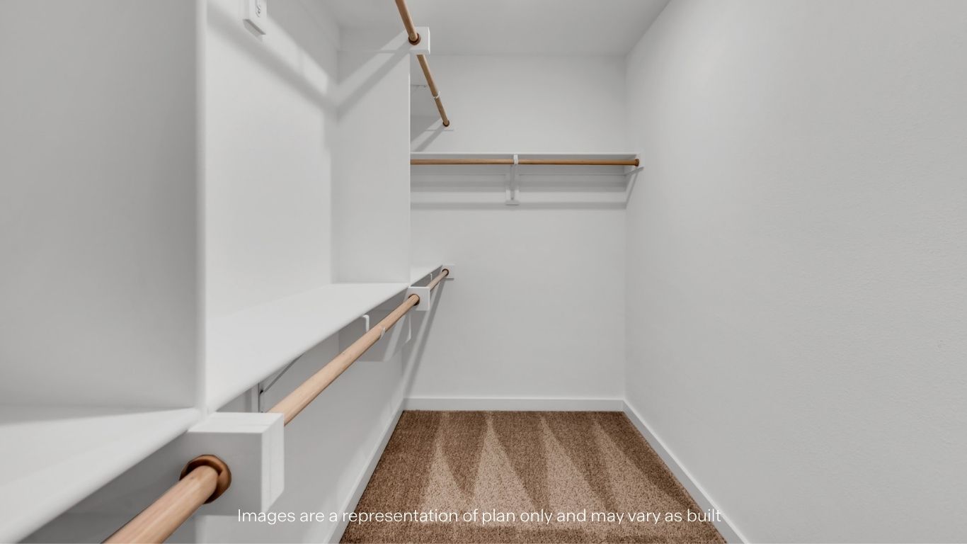 Primary walk-in closet with extra storage space