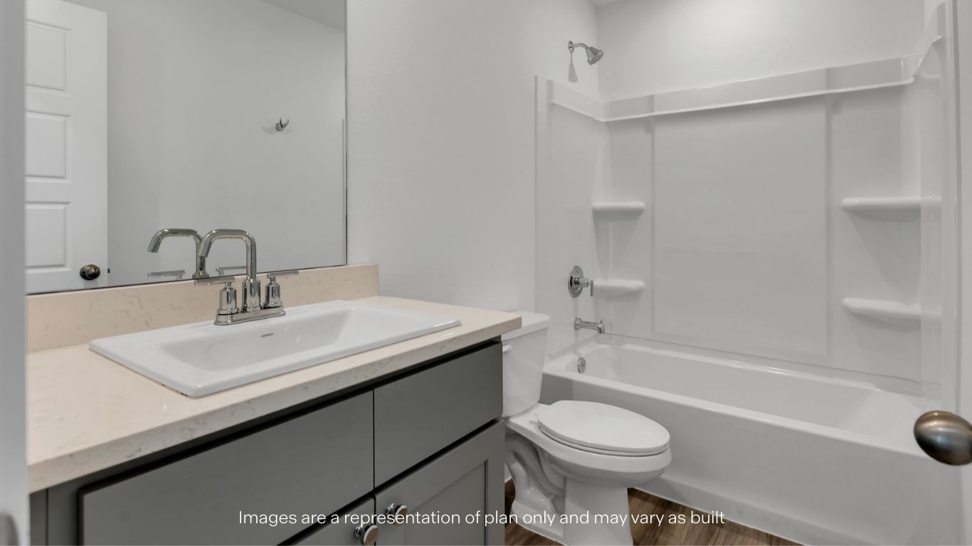 upstairs Guest bathroom located between guest bedrooms