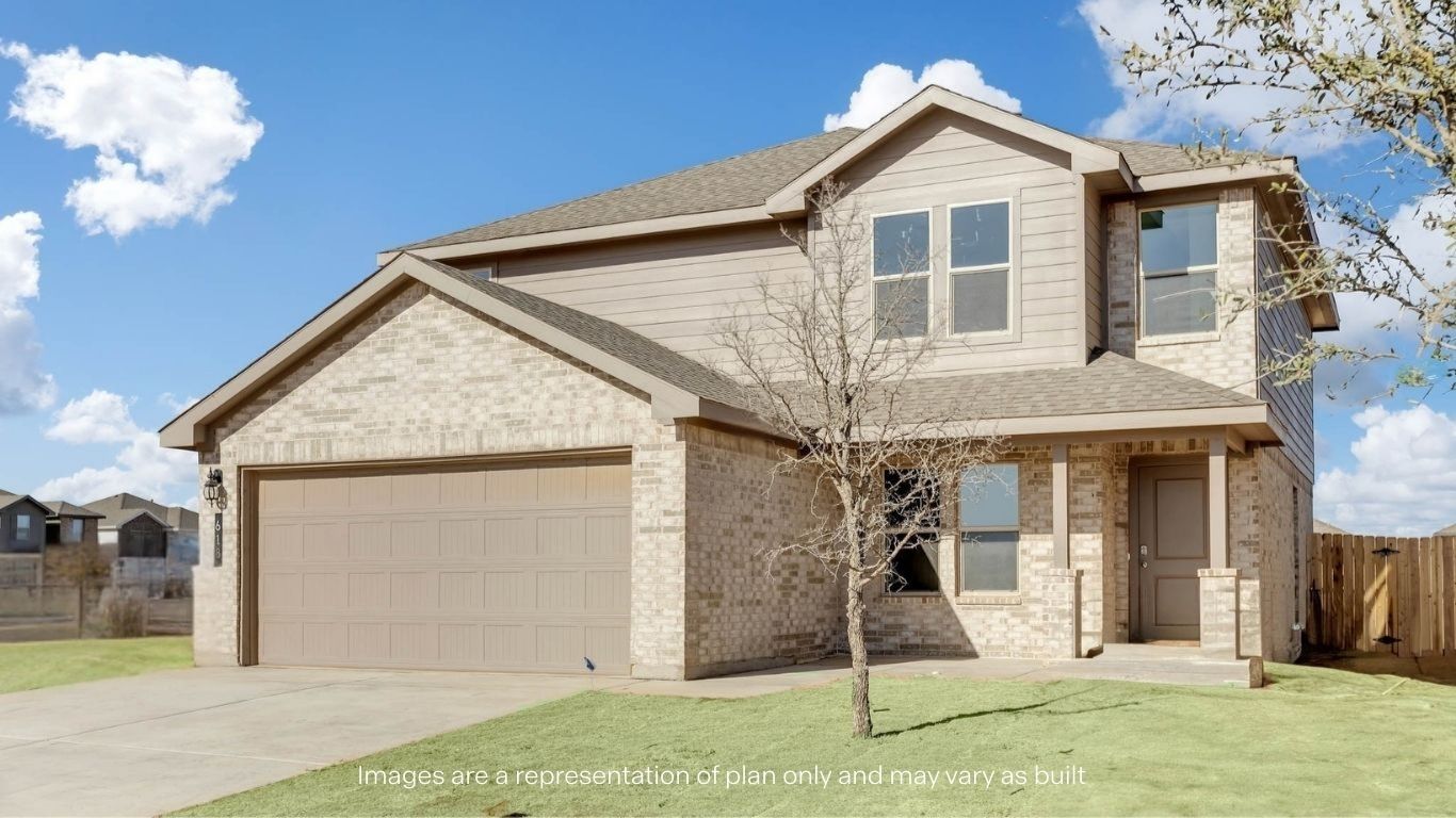 Side view of two story timeless brick home