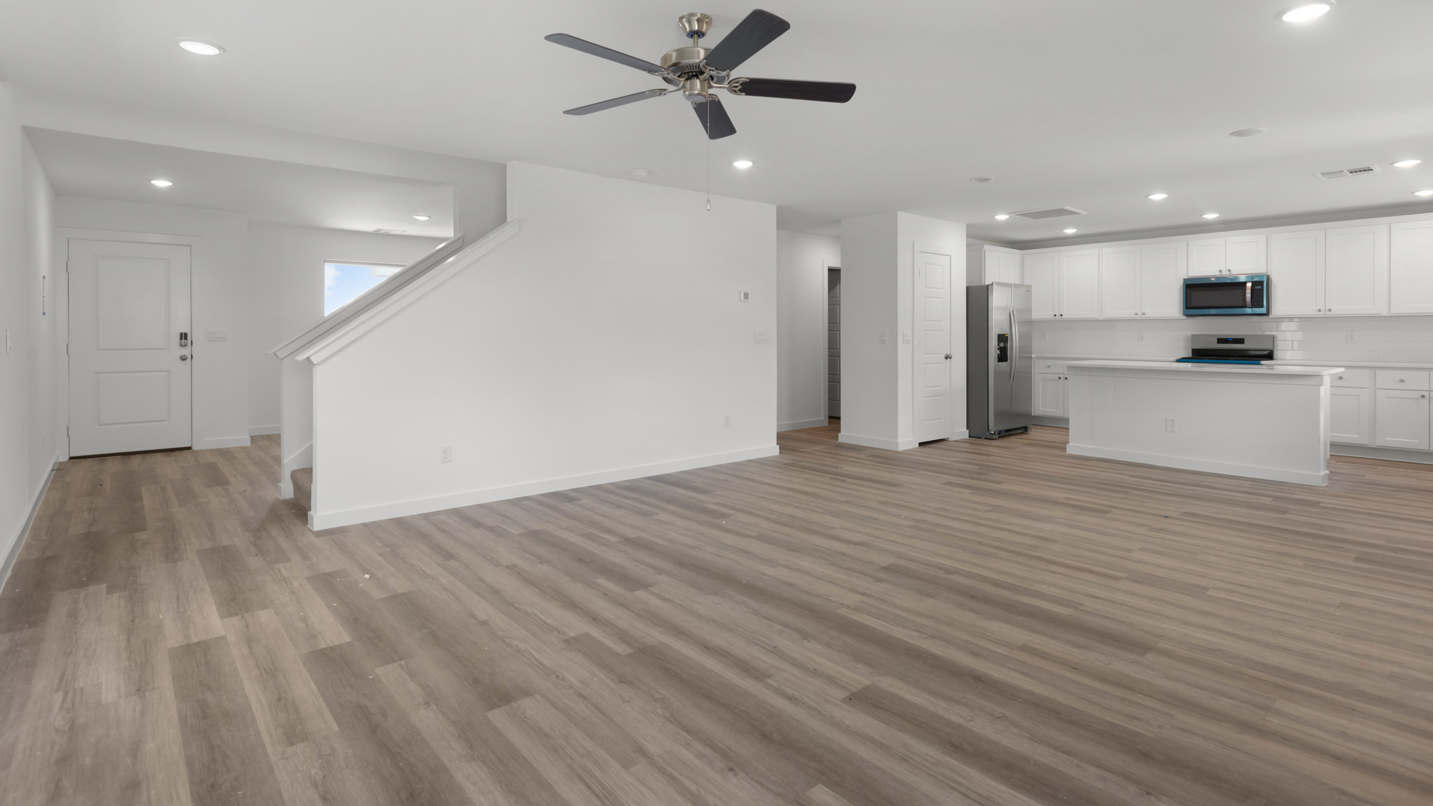 Open concept living, family, dining, and kitchen space