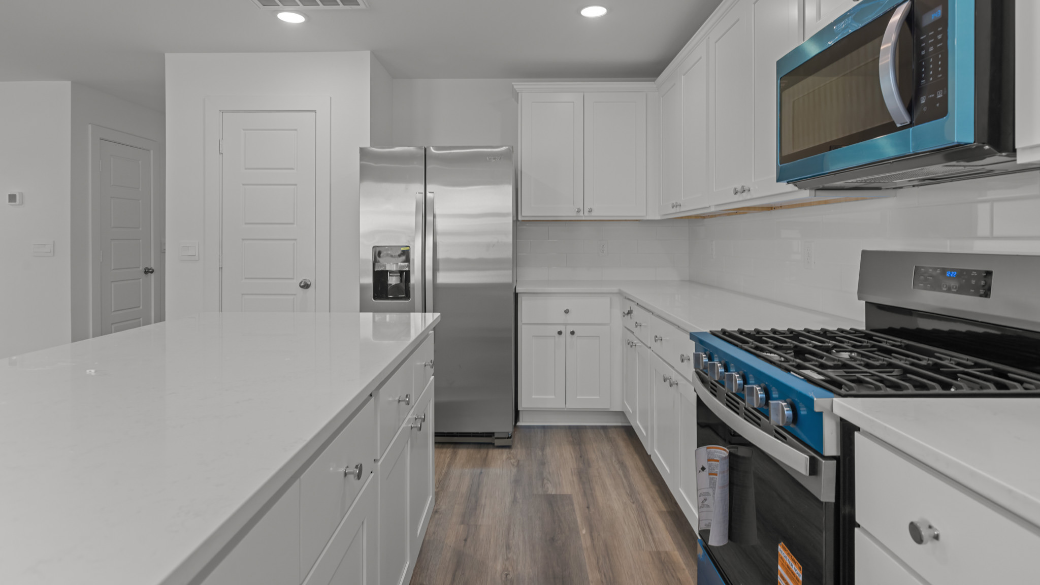 Spacious open kitchen overlooking family and living space