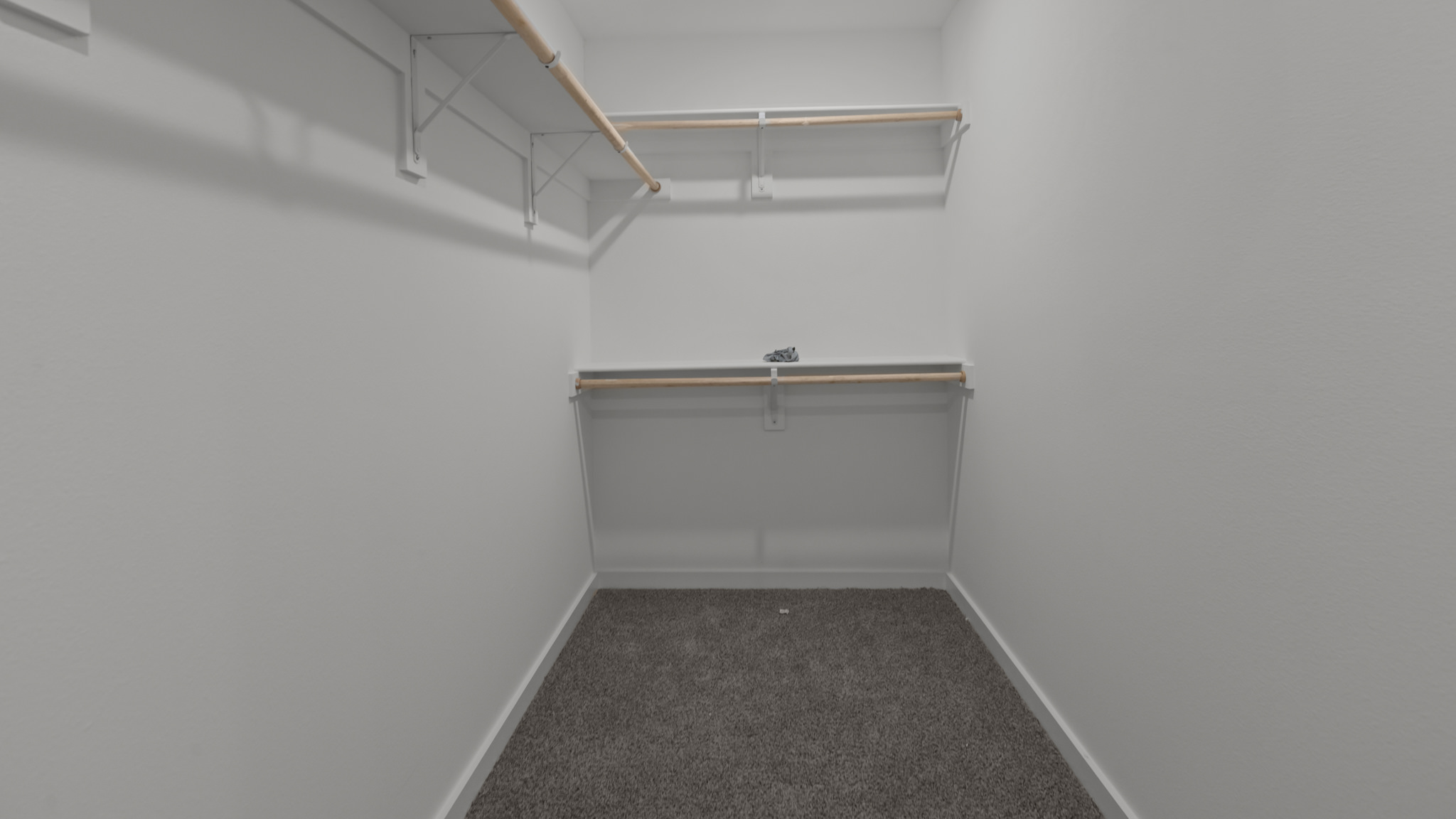 Primary bathroom with attached walk-in closet