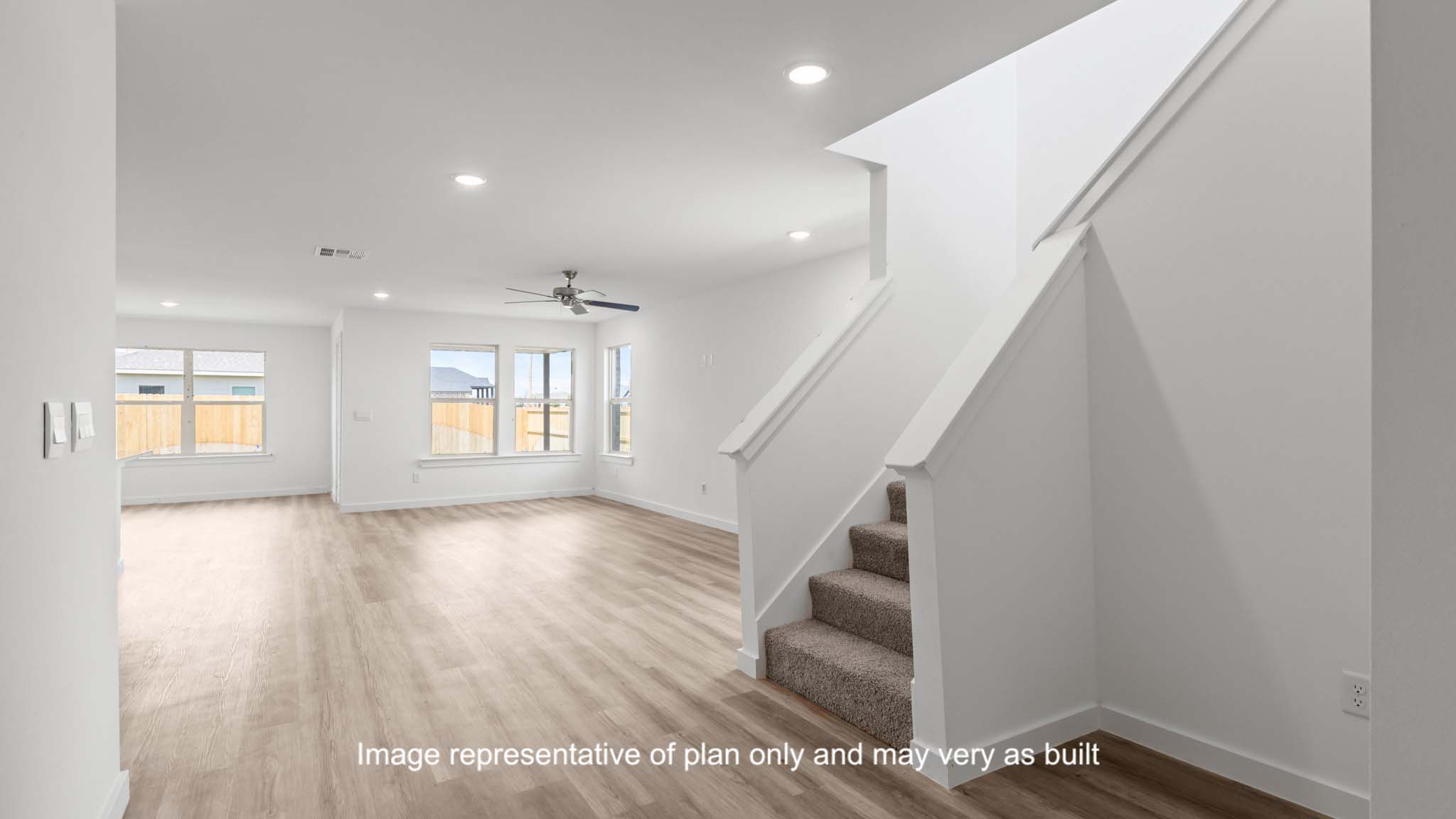 Spacious entrance showing stairs to the side