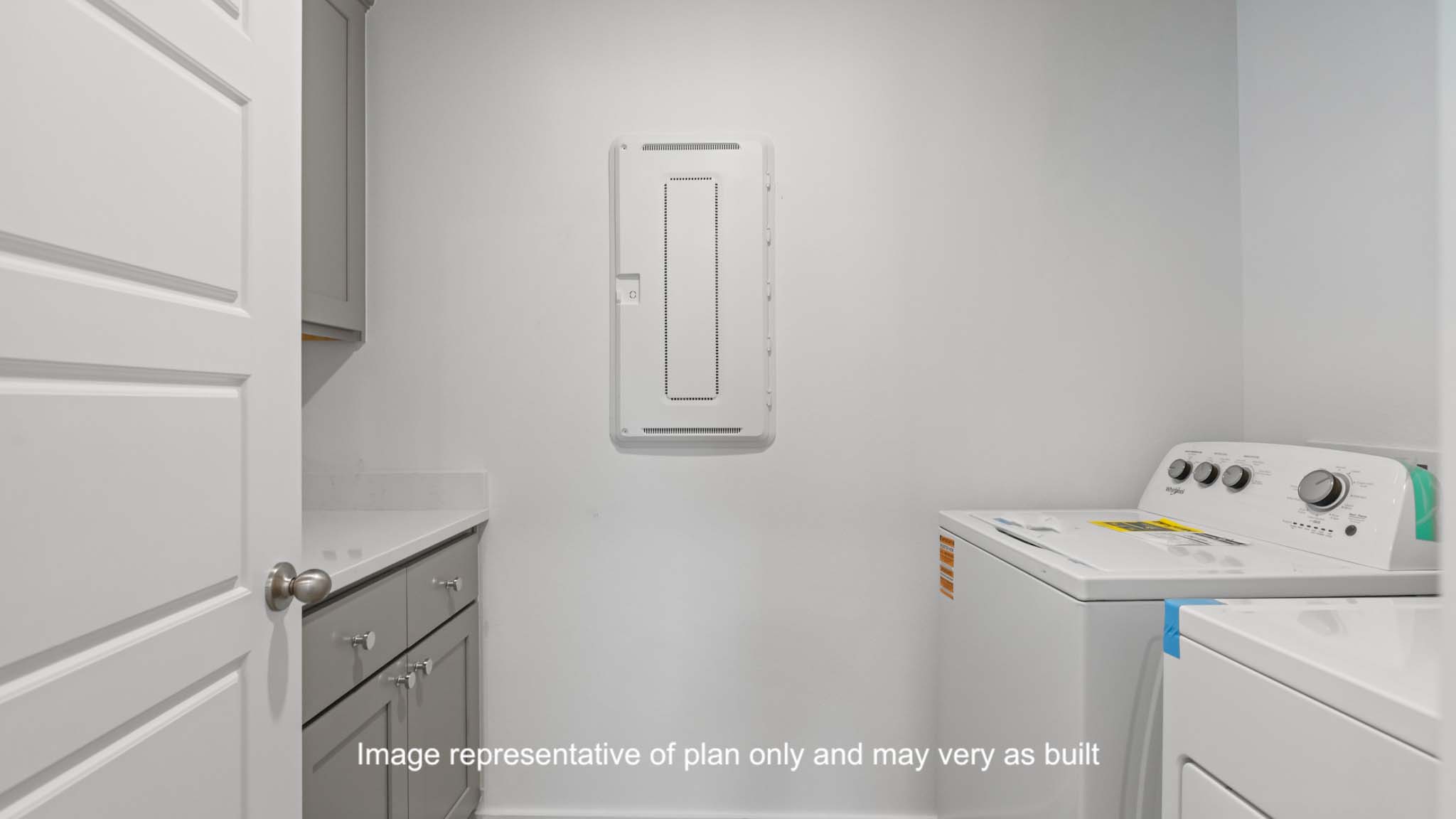 Laundry room and utility closet space with extra storage