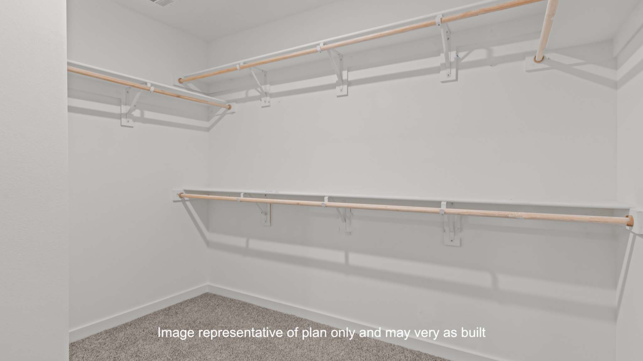 Primary walk-in closet with extra storage space
