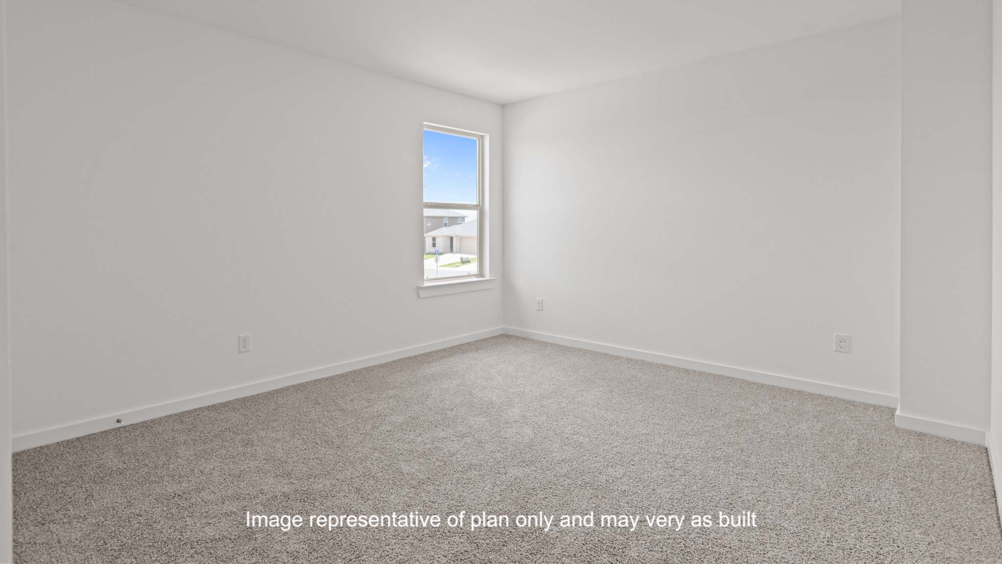 Guest bedroom with side window and plush carpet floor