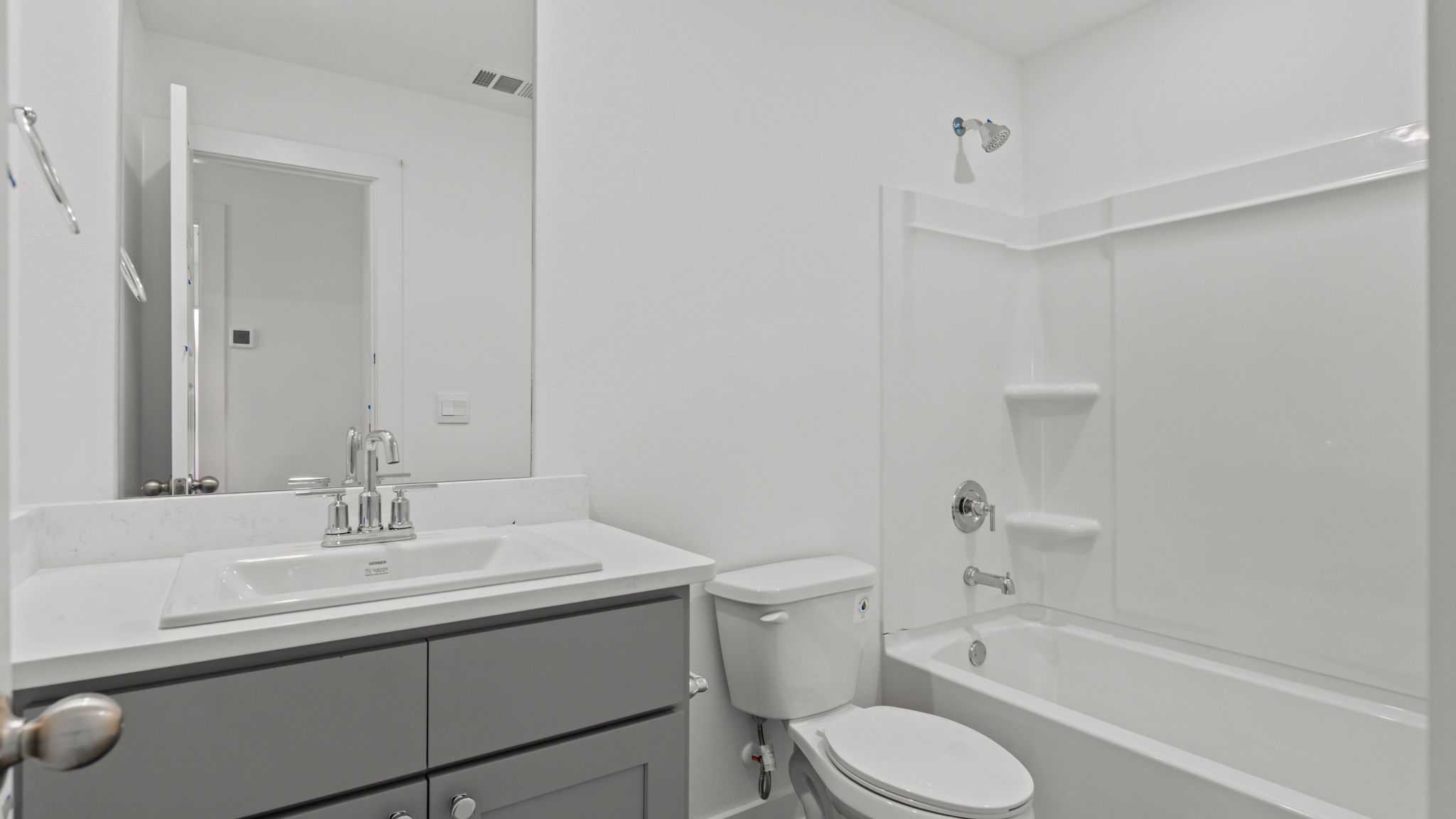 Downstairs guest suite private bathroom