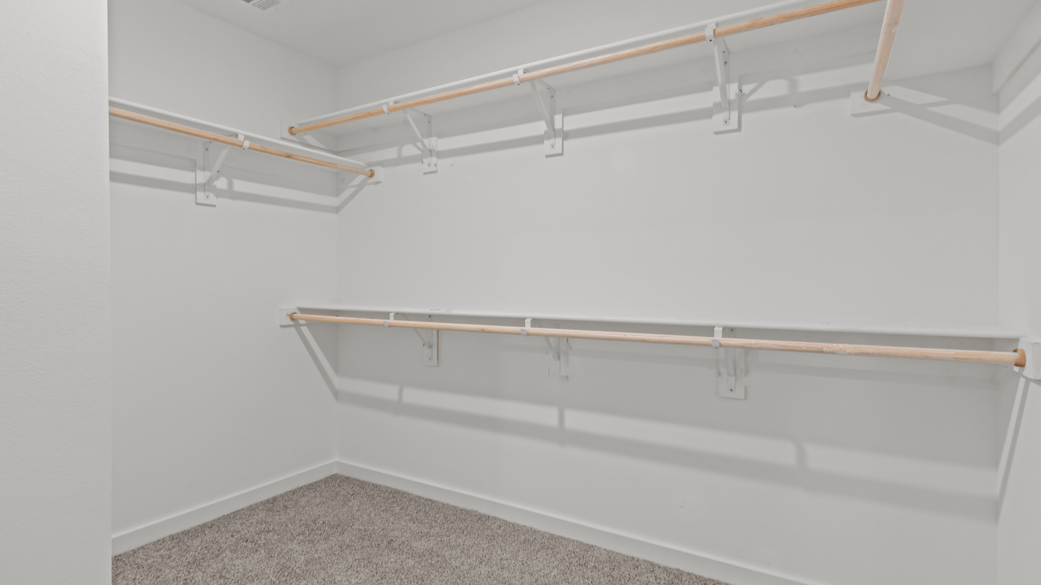 Primary bathroom with attached walk-in closet