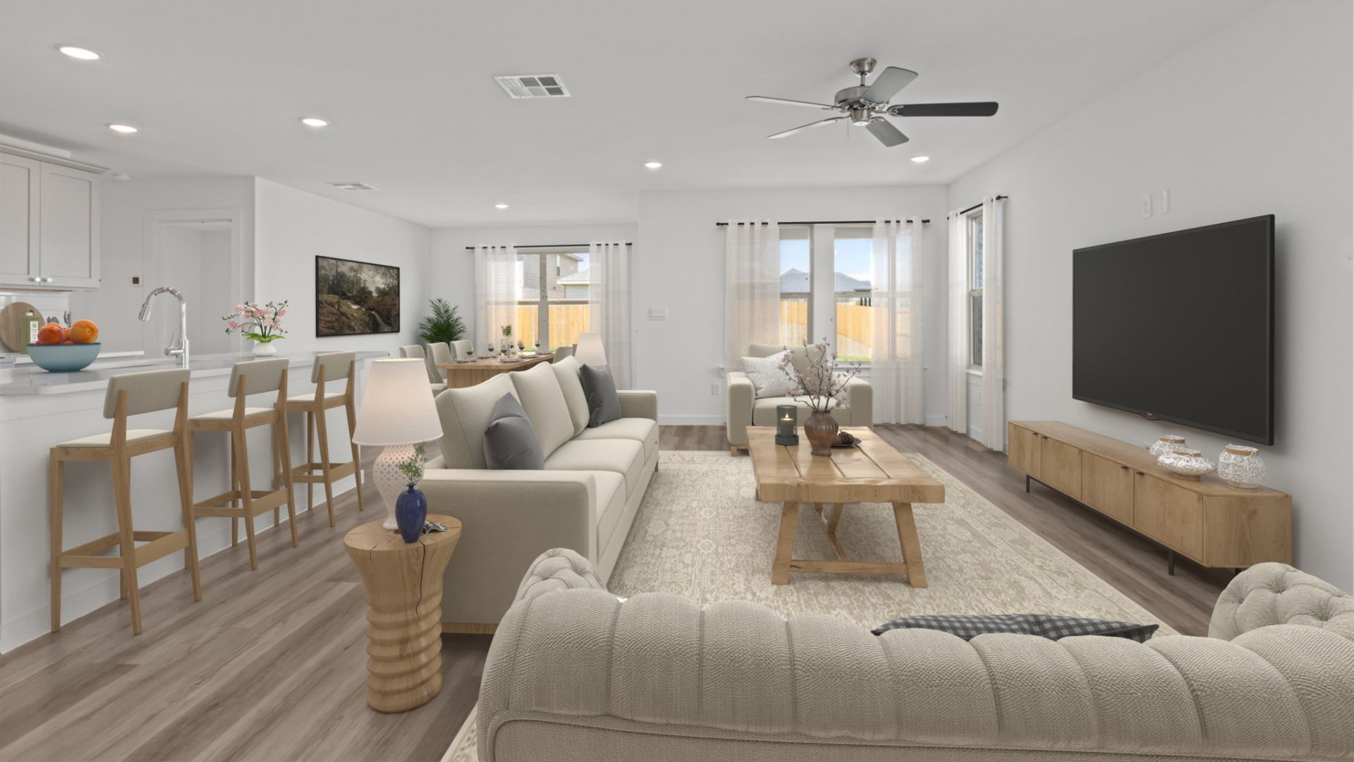 Spacious kitchen island overlooking brightliving and family area