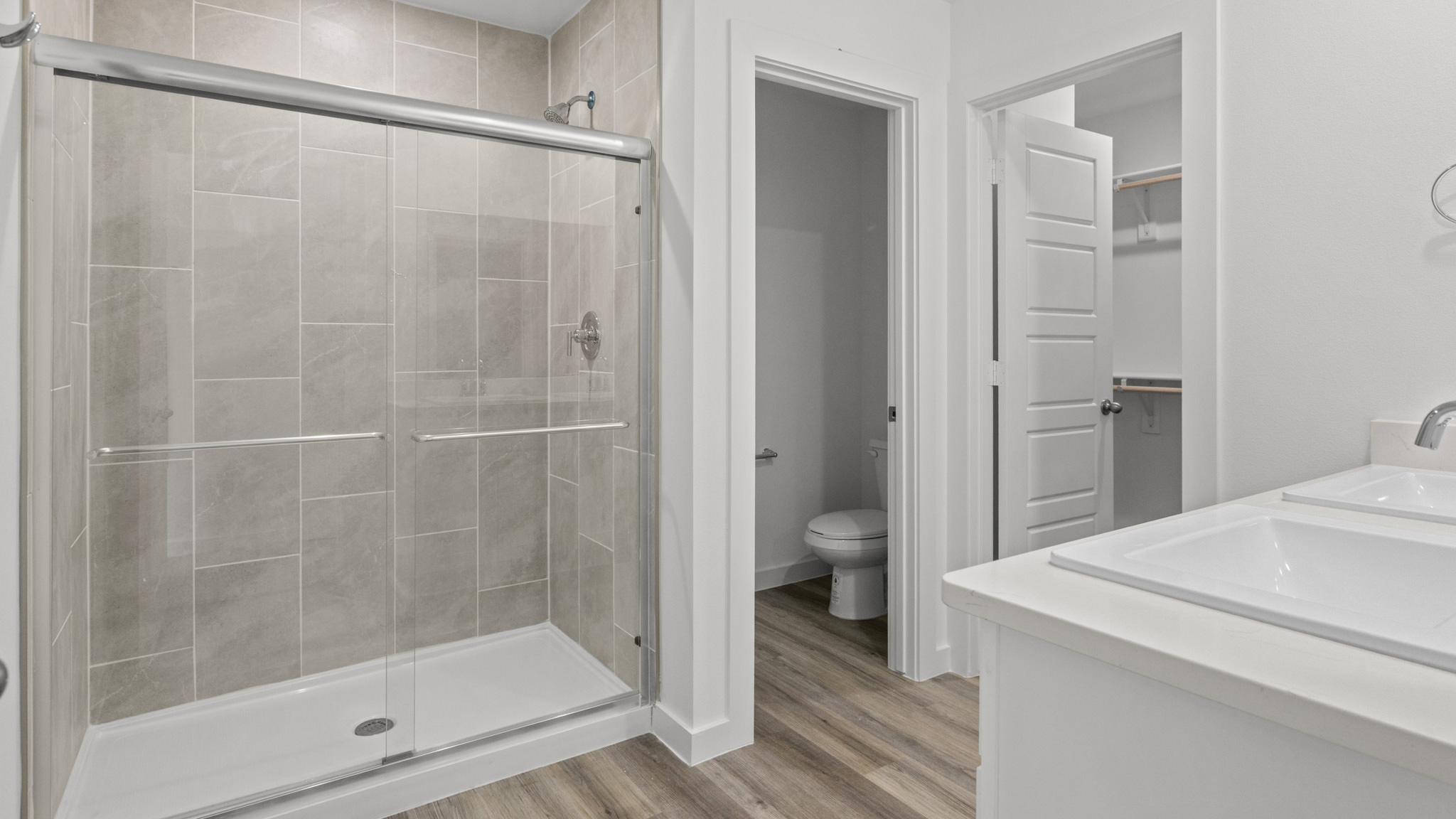 primary bathroom with walk-in shower
