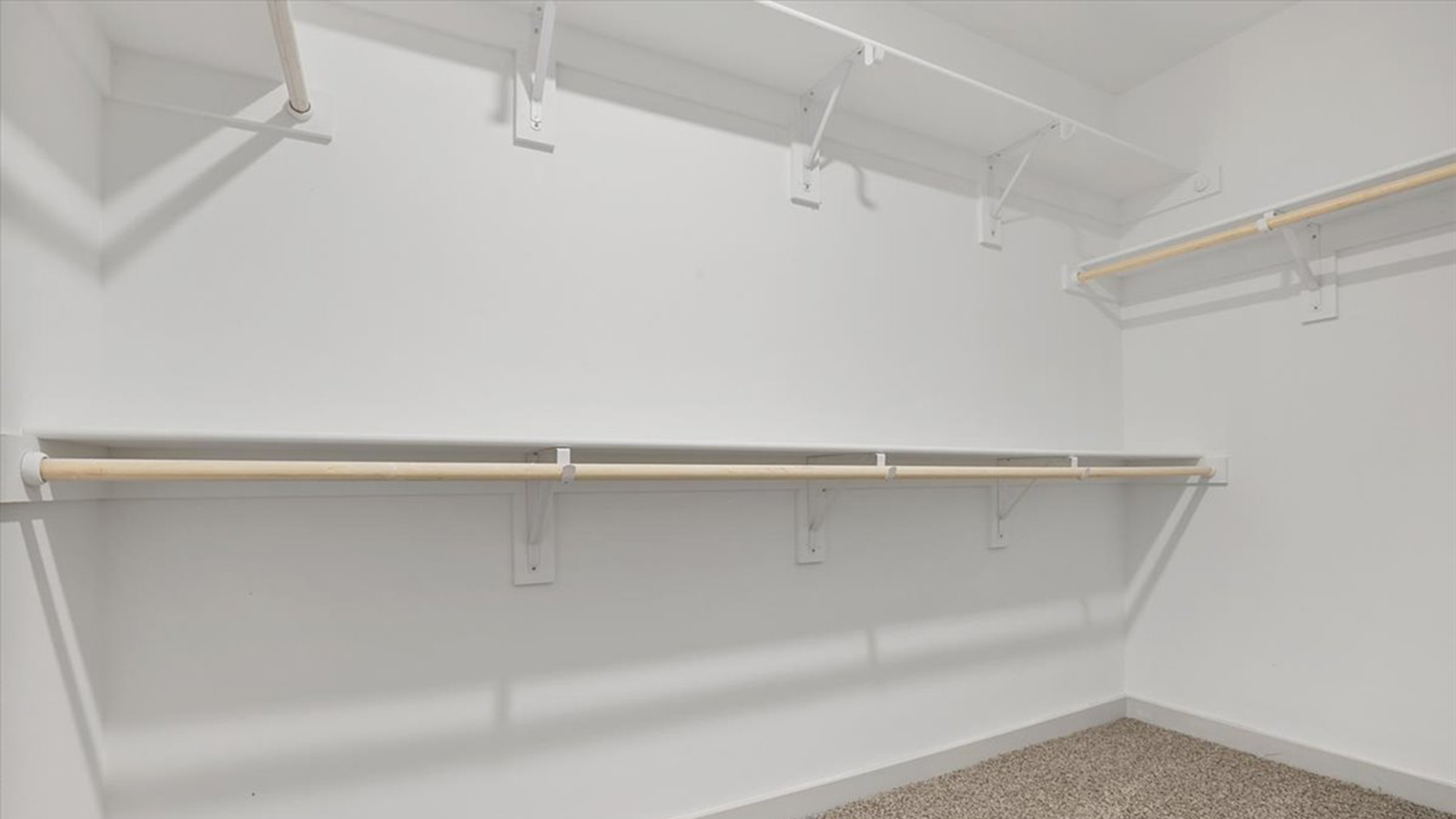 Primary walk-in closet with extra storage space