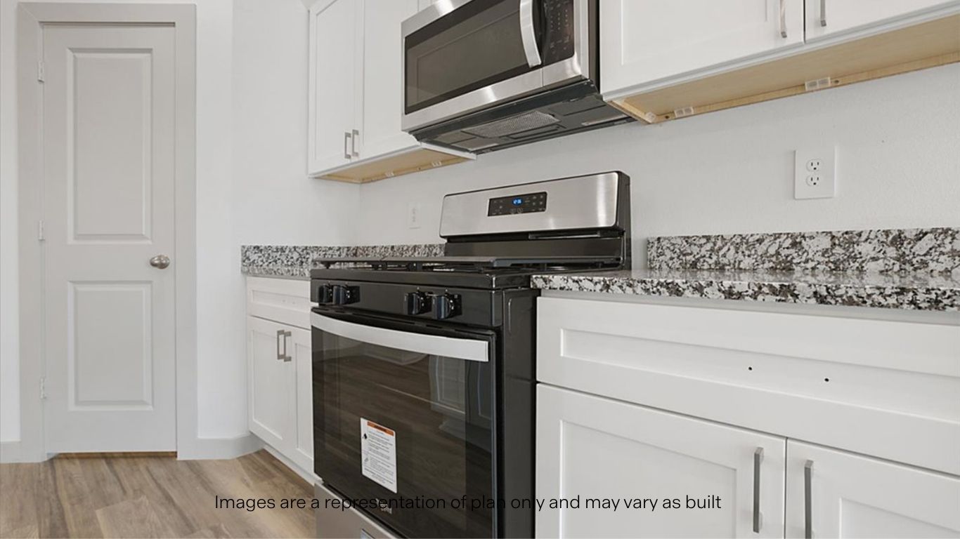 Open concept kitchen with stainless steel appliances, shaker style cabinets, and elevated finishes