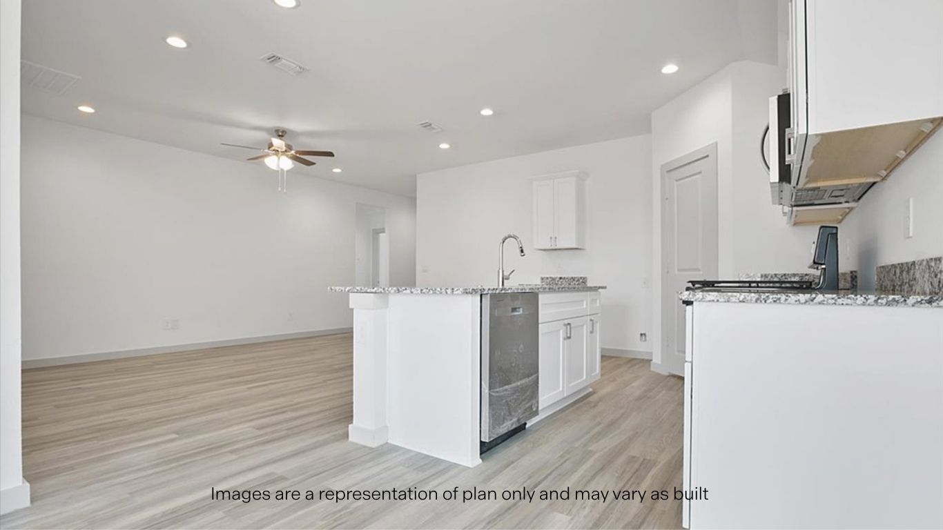 Spacious open concept kitchen with island and counter prep space