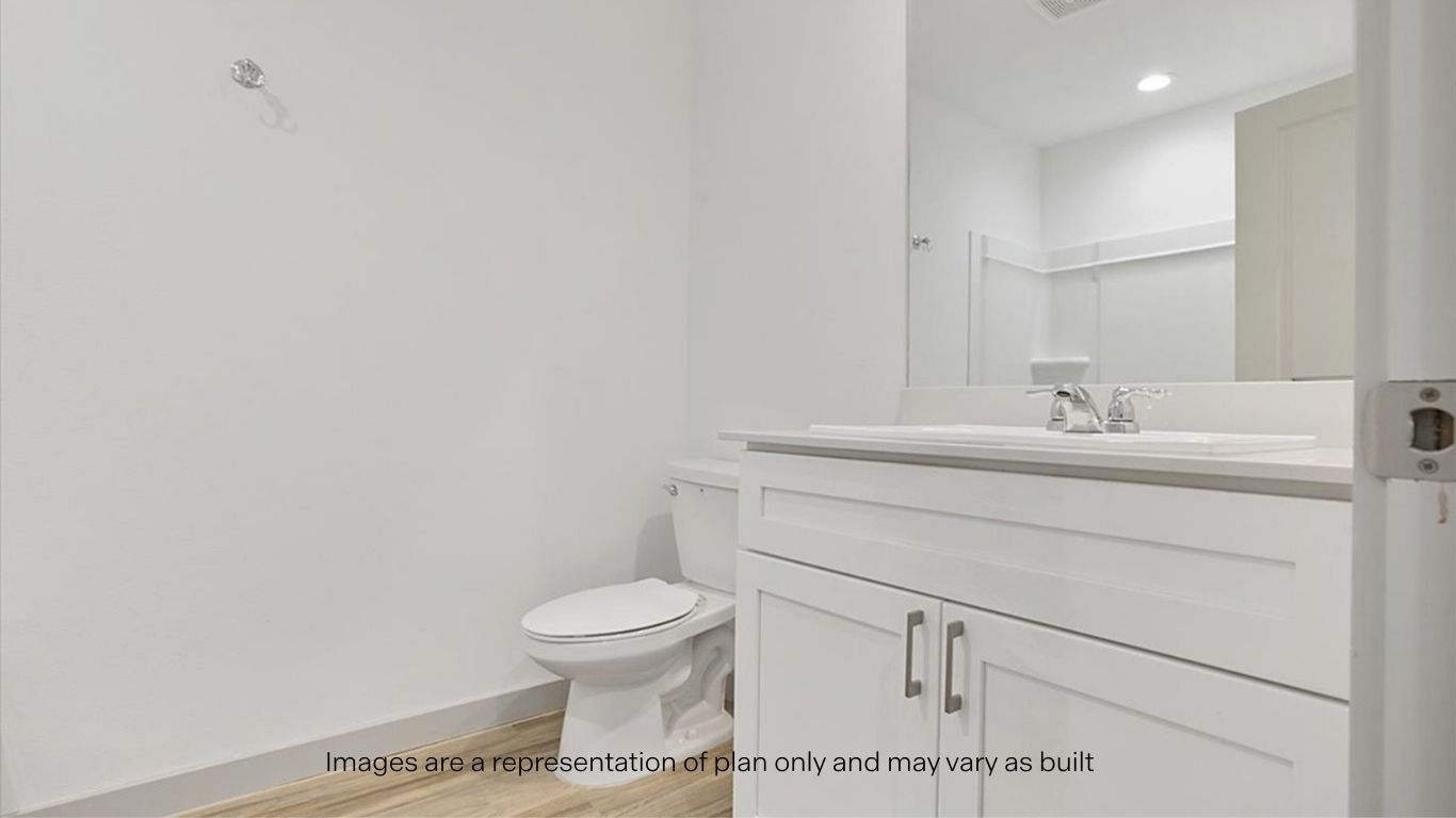 Guest bathroom with built in vanity and combination bathtub shower