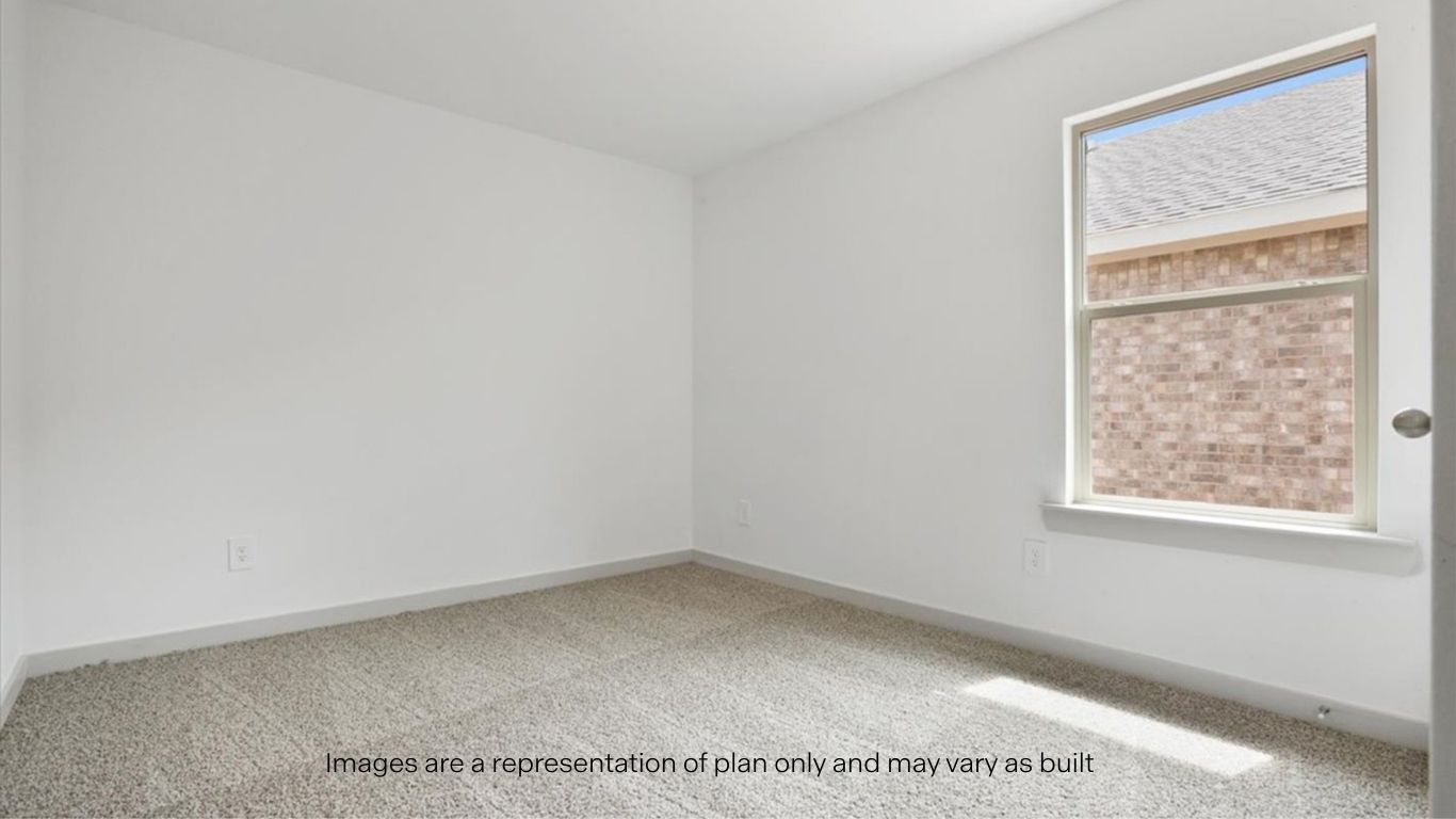 Guest bedroom 2 with side window and plush carpet floor