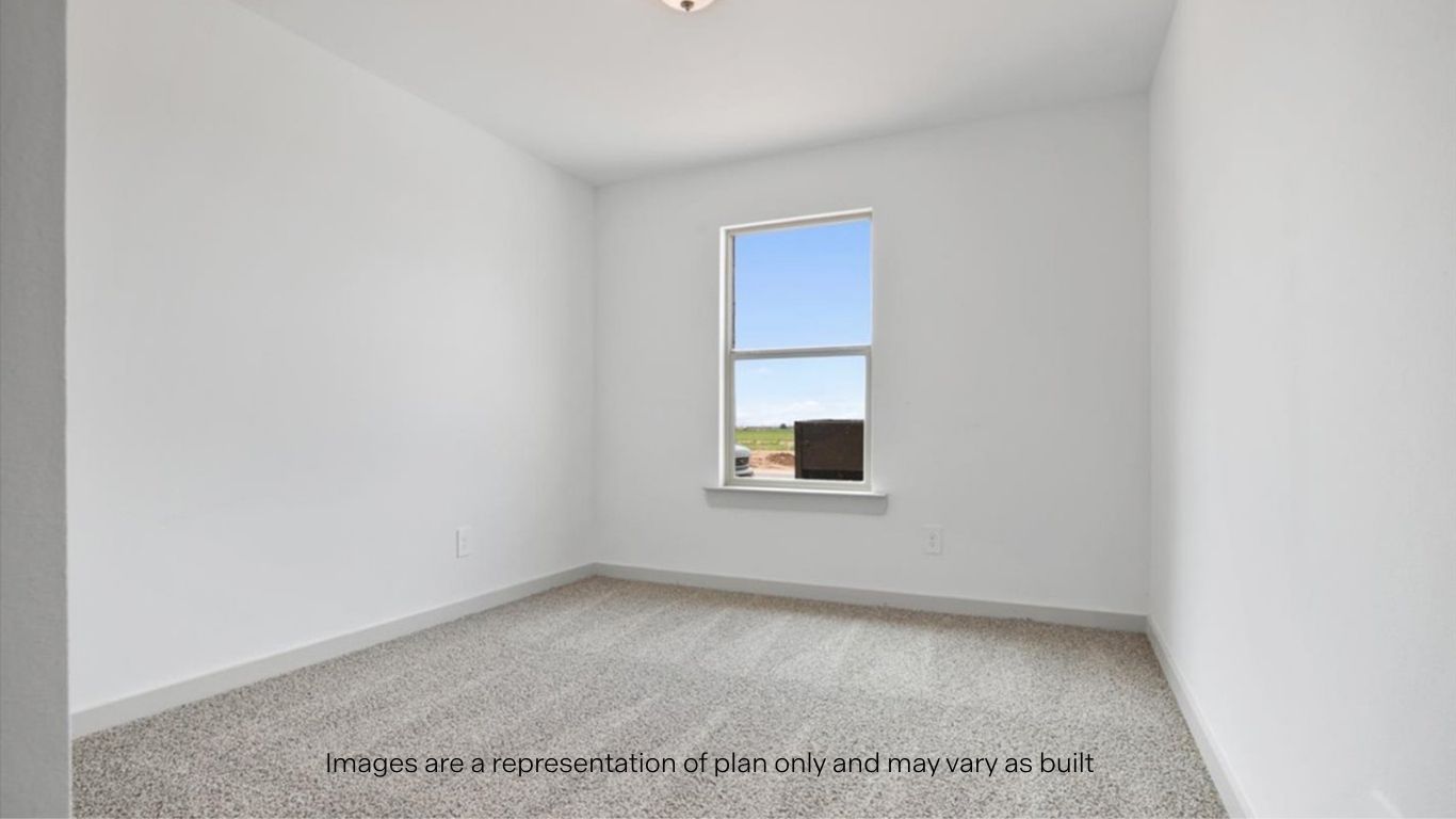 Guest bedroom 1 with front windows and ample natural light