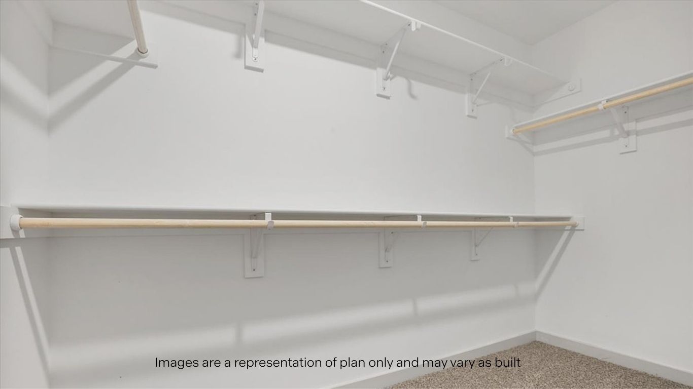 Primary walk-in closet with extra storage space