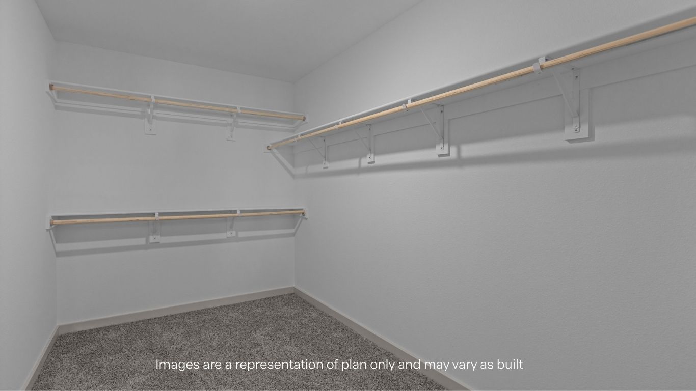 Primary walk-in closet with extra storage space