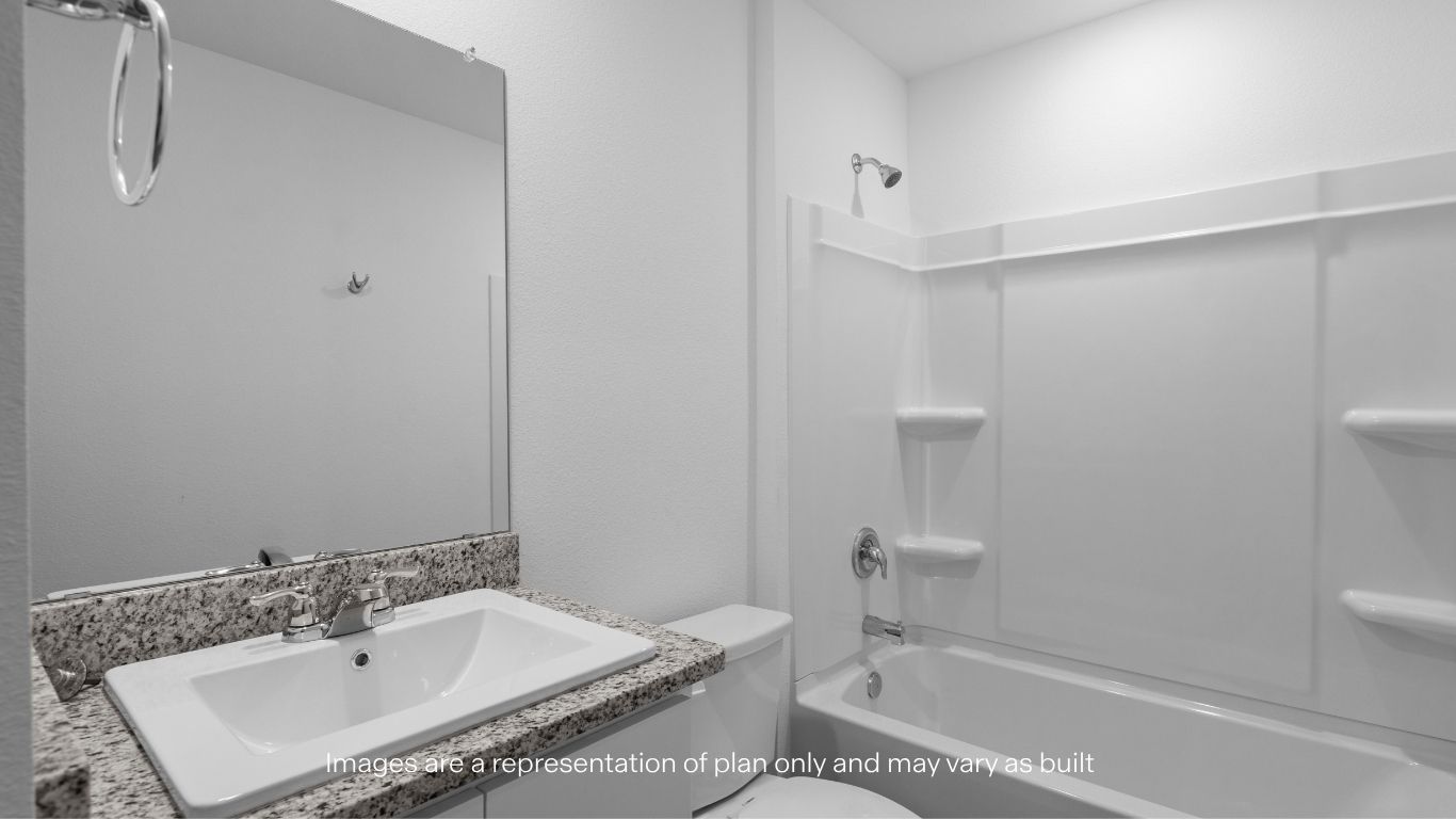 Guest bathroom located between guest bedrooms