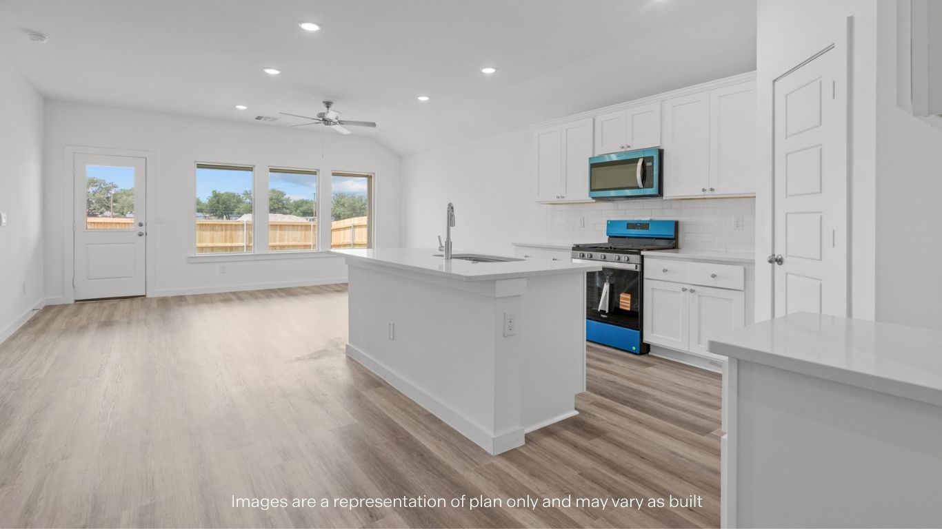 Open concept kitchen, living, family, and dining room space