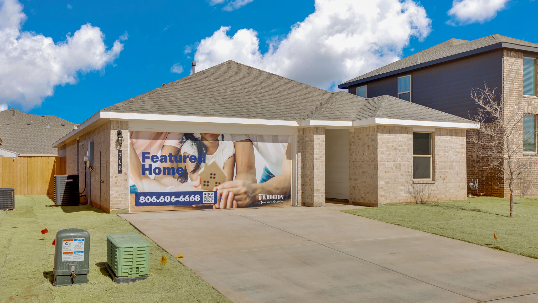 Single story classic brick home with front entry