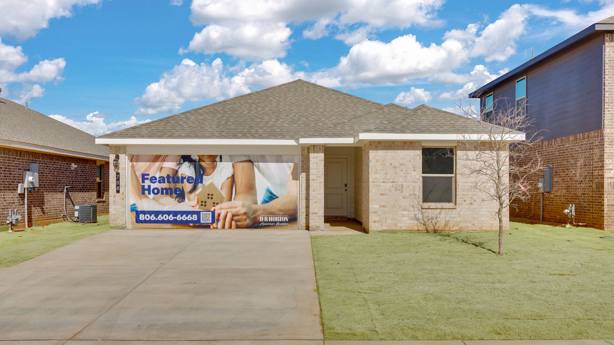 Exterior of single story modern brick style home