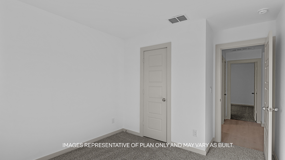 Guest bedroom 3 with plush carpet floors and spacious closet