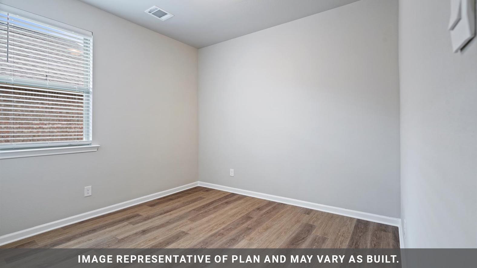 Guest bedroom with side window and spacious closet