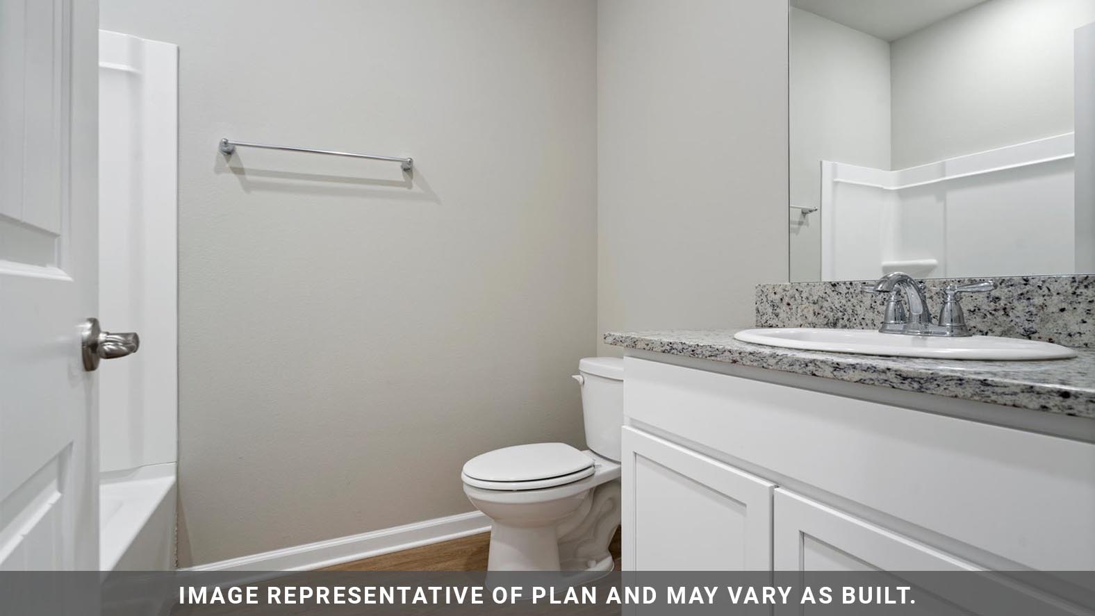 Guest bathroom located between guest bedrooms