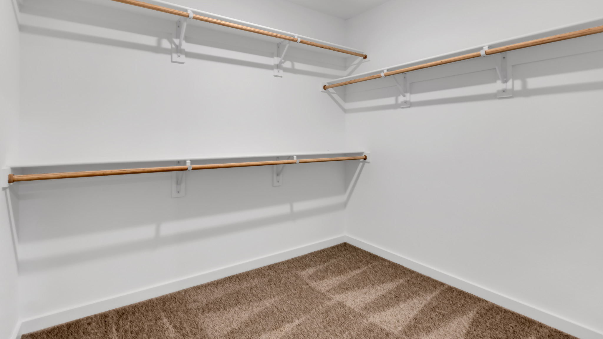Primary room walk in closet with extra storage space
