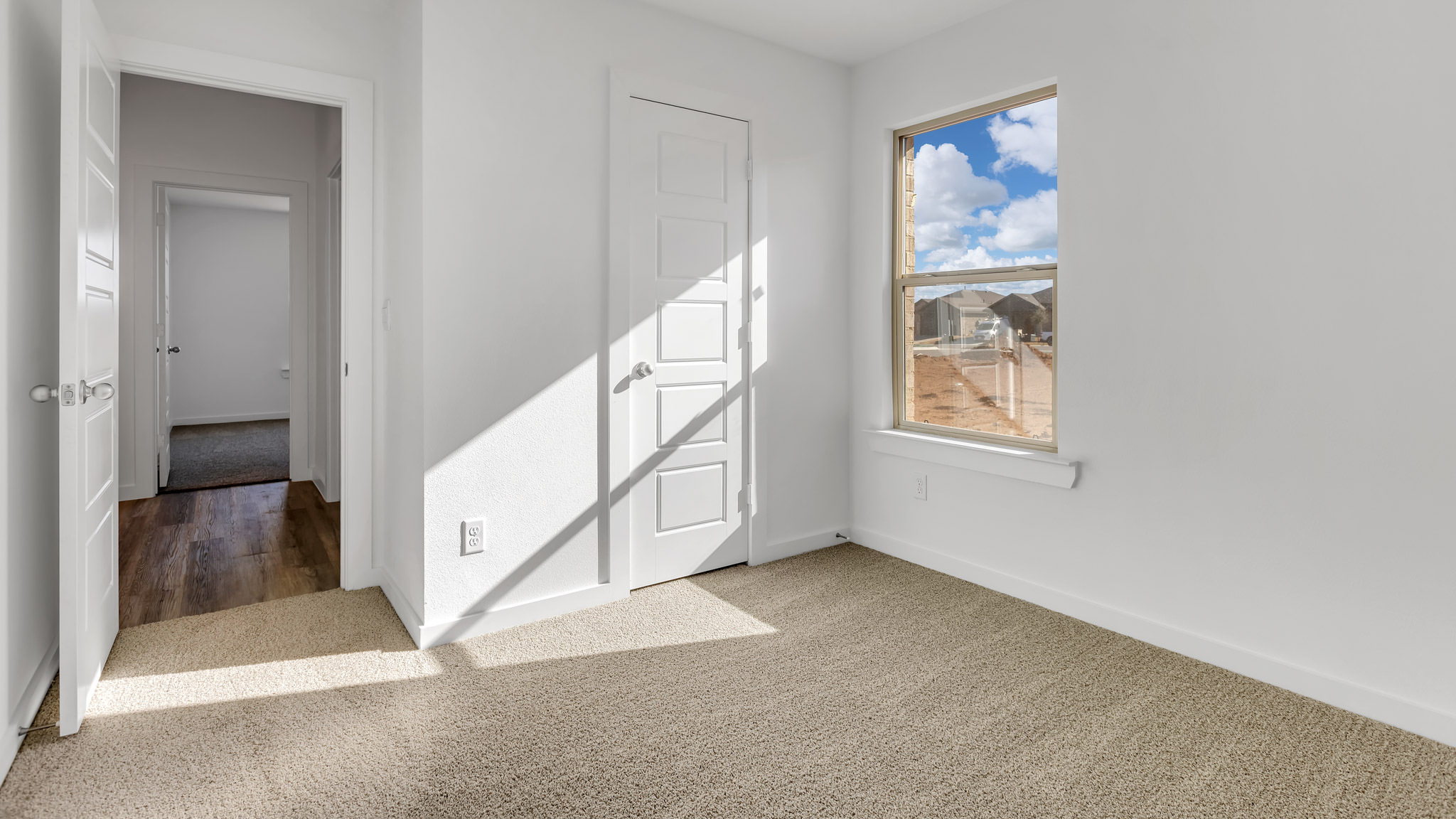 Bedroom 2 with side window and spacious closet