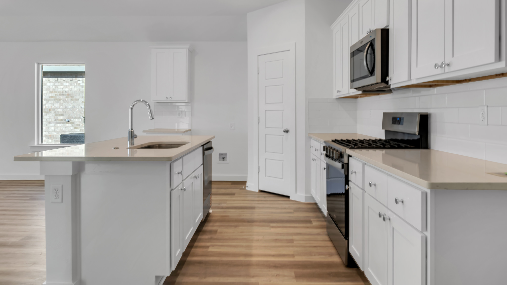 Stainless steel appliances and shaker style cabinets